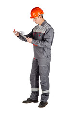 Male builder over white wall background. repair, construction, building, people and maintenance concept.