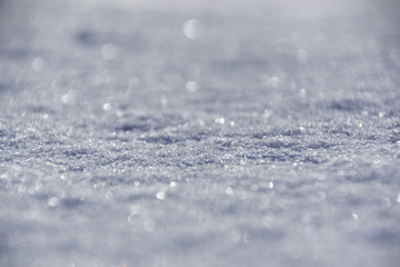 Closeup of frozen snowflakes on grassland  ground