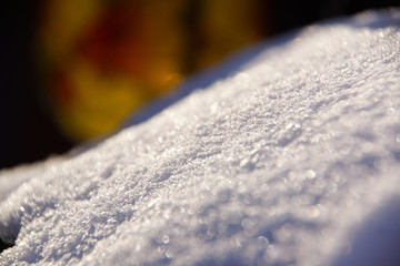 Closeup of frozen snowflakes on grassland  ground