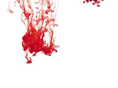Red color pigment in water on white background