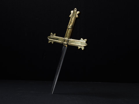 Dagger with gold cross handle