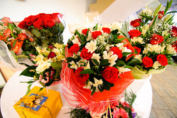 Bouquets with red roses.