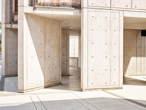 Sunlight on concrete walls in empty building