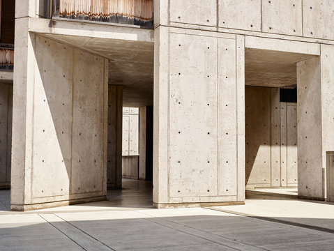 Sunlight on concrete walls in empty building