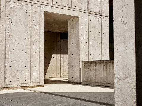 Sunlight on concrete walls in empty building
