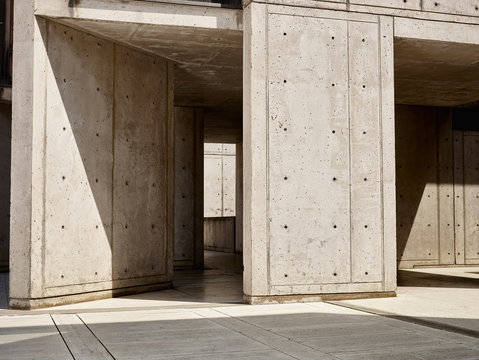 Sunlight on concrete walls in empty building