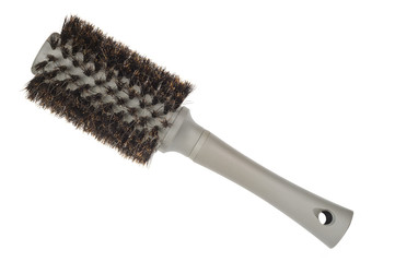 comb with hair on white background