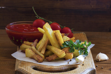 appetizing golden hot french fries in rural