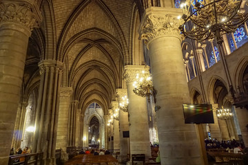 Fototapeta na wymiar Paris, France- circa May, 2017: Notre Dame de Paris Cathedral Interior on May 2017. Notre Dame construction began in the year 1163 and was completed in the year 1345