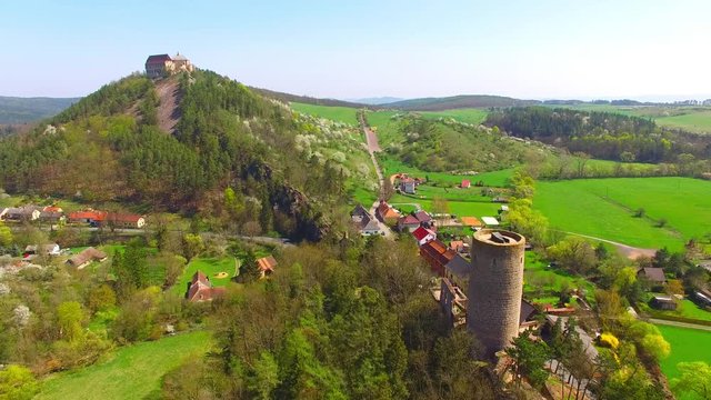 Drone flight around Zebrak Castle. A ruin of a Gothic castle originated in the 13th century. Since 1336 a royal castle, enlarged by Kings Charles IV. Czech famous monument from above. 