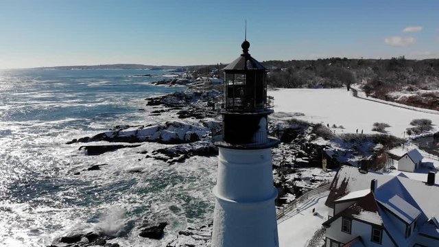 Aerial Circling Maine Lighthouse - Winter