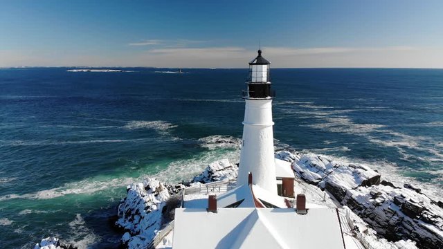 Aerial of Maine Lighthouse from Land - Winter