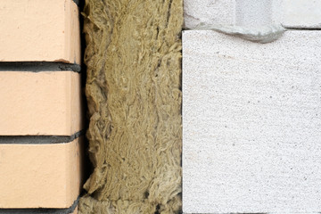 house made of foam concrete insulated with mineral wool and lined with bricks