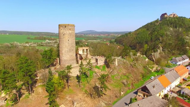 Drone flight around Zebrak Castle. A ruin of a Gothic castle originated in the 13th century. Since 1336 a royal castle, enlarged by Kings Charles IV. Czech famous monument from above. 