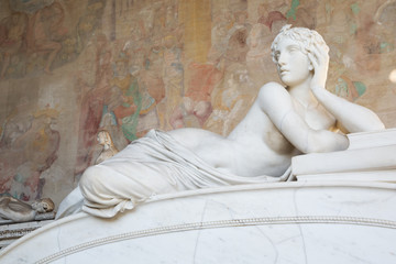 Old beatiful statue of naked woman in Pisa