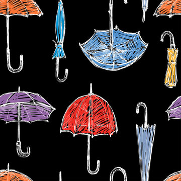 Seamless background of the drawn umbrellas