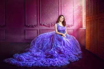 Portrait of young girl in luxurious purple long dress