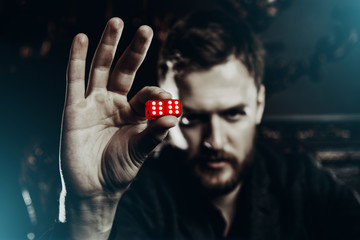 gambler man shows dice