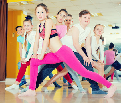 Happy teenagers in dance studio