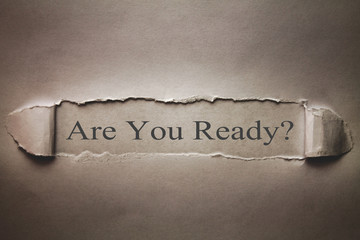 Are You Ready text on torn paper.