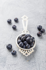 Blueberries in a small metal strainer