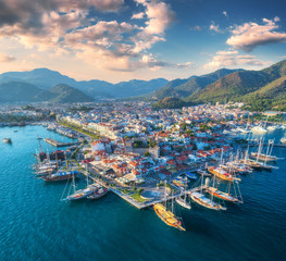 Aerial view of boats and yachts and beautiful architecture at sunset in Marmaris, Turkey. Landscape...