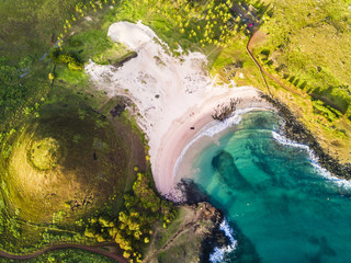 Anakena Beach from the air, an aerial view of the most famous beach at Easter Island and maybe the...