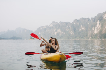 Couple paddling in a canoe