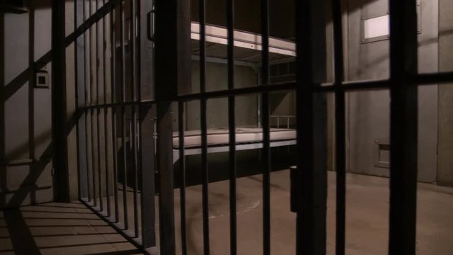 LOW ANGLE JAIL CELL, SLIDER SHOT