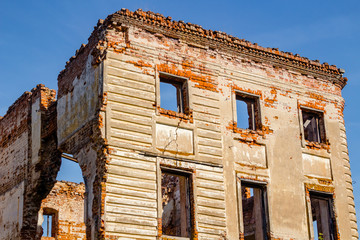 Ruins of a ruined 18th century manor in the autumn day
