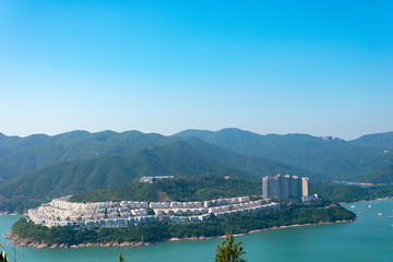 A view of a resort from the top of a hill on Dragon's Back hiking trail, Hong Kong Asia