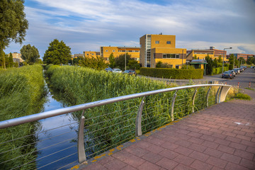 Modern footbridge in suburban area