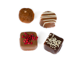 handmade chocolate candies isolated on white background