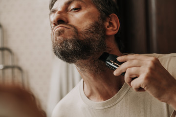 Haircut with gray hair trimmer