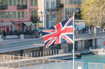 Fototapeta na wymiar Great Britain flag in the harbour