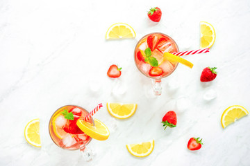 Colorful refreshing strawberry lemonade juice drinks for summer