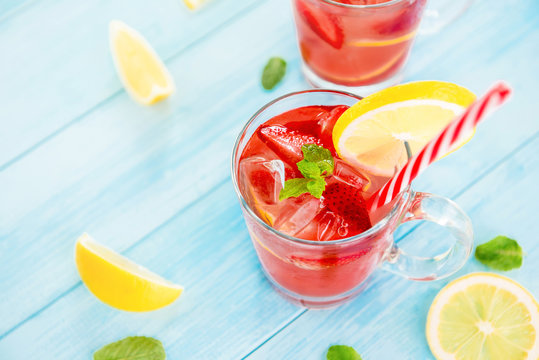 Colorful refreshing strawberry lemonade juice drinks for summer