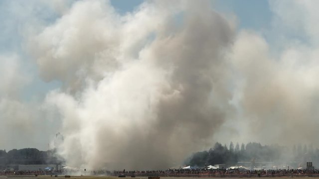 Smoke from jet car over runway at Hillsboro Air Show