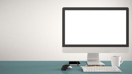 Fototapeta premium Desktop mockup, template, computer on blue pantone colored work desk with blank screen, keyboard mouse and notepad with pens and pencils, white background