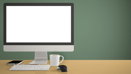 Desktop mockup, template, computer on yellow work desk with blank screen, keyboard mouse and notepad with pens and pencils, green pantone colored background