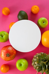 exotic fruits on a pink background