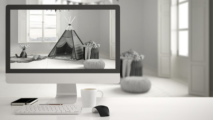 Architect house project concept, desktop computer on white work desk showing scandinavian child room, minimalistic blurred interior design in the background