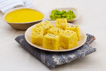 Indian Traditional Street Food Khaman Dhokla Served With Chutney & Chilli