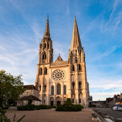 View of Chartres Cathedral West facade in sunset rays