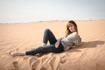 Fototapeta na wymiar Girl have fun in desert in a day
