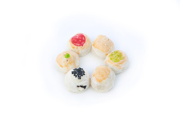 Spring roll pastry with nuts and salted eggs, chinese pastry isolated on white background.
