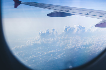 Naklejka na ściany i meble cloud view from plane window traveling