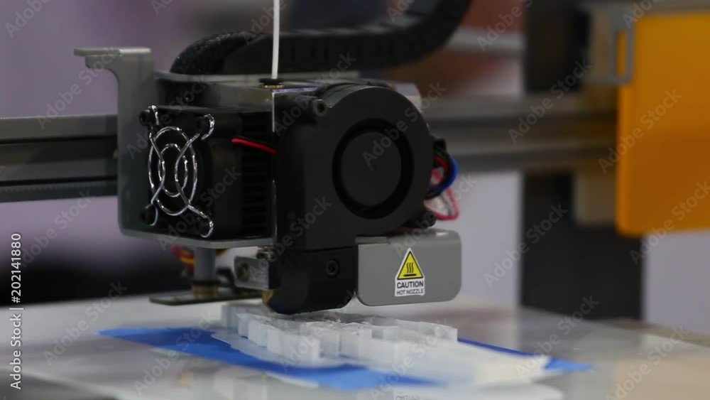 Poster a 3d printer in the laboratory prints a structure from a polymer
