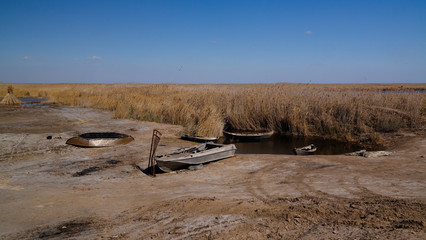 runed Urga fishing village at the shore of Sudochye lake aka part of former Aral sea at Karakalpakstan, Uzbekistan