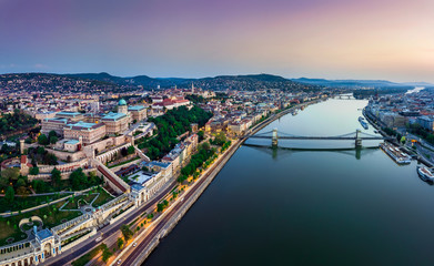 Budapest, Hungary - Panoramic aerial view of Budapest. This view includes Buda Castle Royal Palace, Matthias Churcs, Fisherman's Bastion and Szechenyi Chain Bridge at sunset with colorful sky